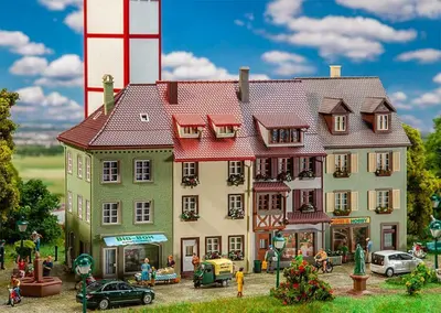 Trzyczęściowy zestaw budynków mieszkalnych